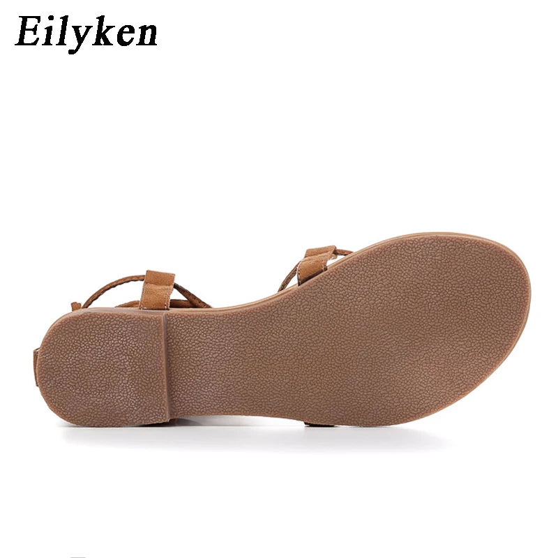 Eilyken Designer Ankle Strappy Flat Heels Women Sandals 2025 Summer Clip Toe Casual Roman Gladiator Flip Flops Shoes