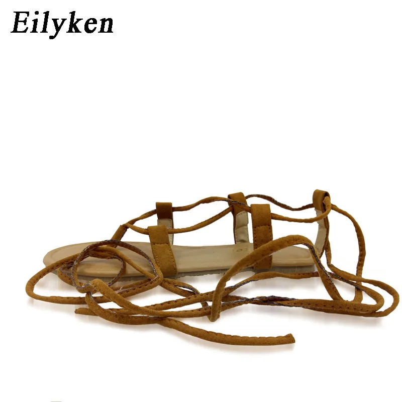 Eilyken Designer Ankle Strappy Flat Heels Women Sandals 2025 Summer Clip Toe Casual Roman Gladiator Flip Flops Shoes