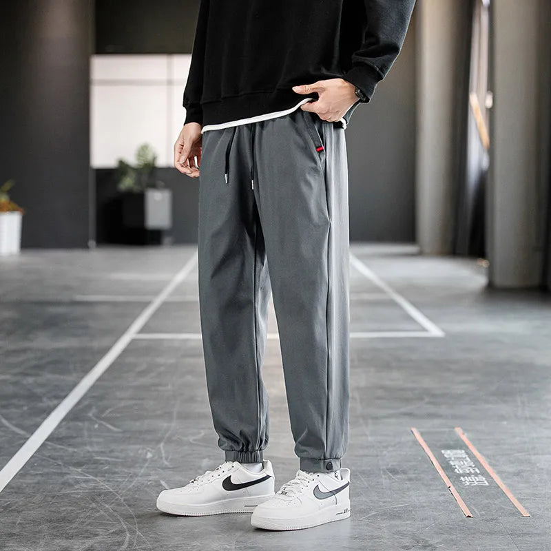 Plus Size Trousers Men's 2024 New M-8XL Ice Silk Pants Drawstring Feet Leisure Sports Running Fitness Harajuku Trousers