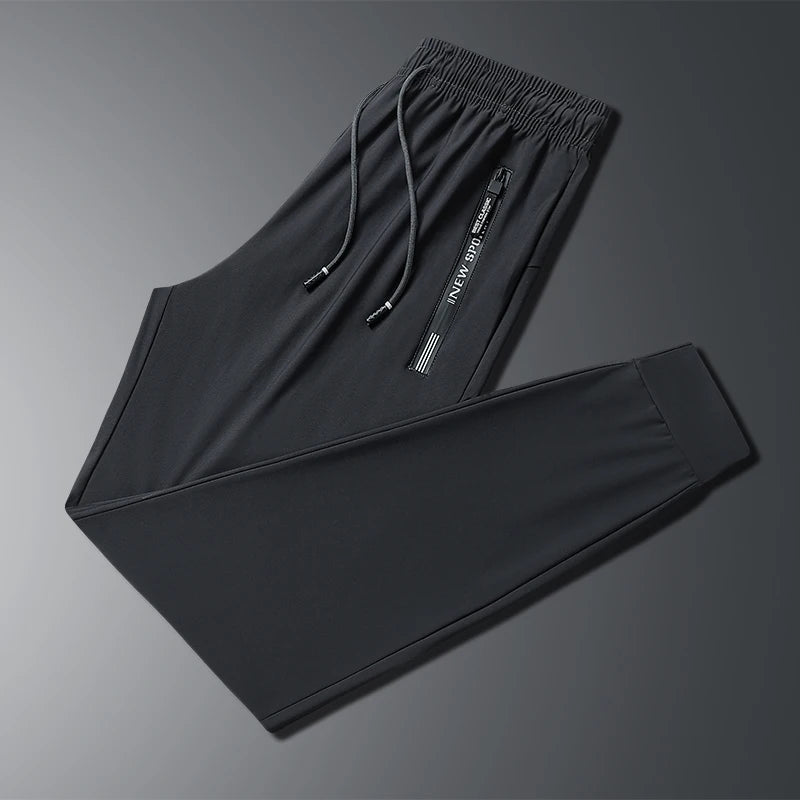 New Summer Korean Ice Silk Elastic Trousers Cool Thin Casual Men'S Loose Long Large Size Small Foot Sports Pants 8XL