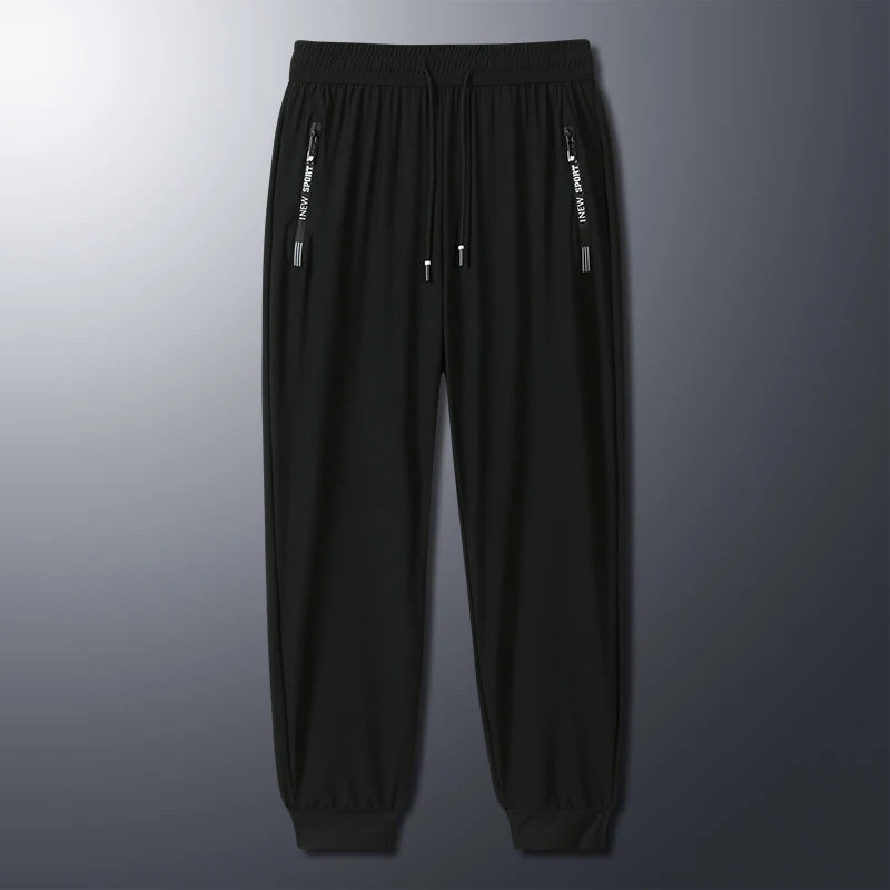 New Summer Korean Ice Silk Elastic Trousers Cool Thin Casual Men'S Loose Long Large Size Small Foot Sports Pants 8XL