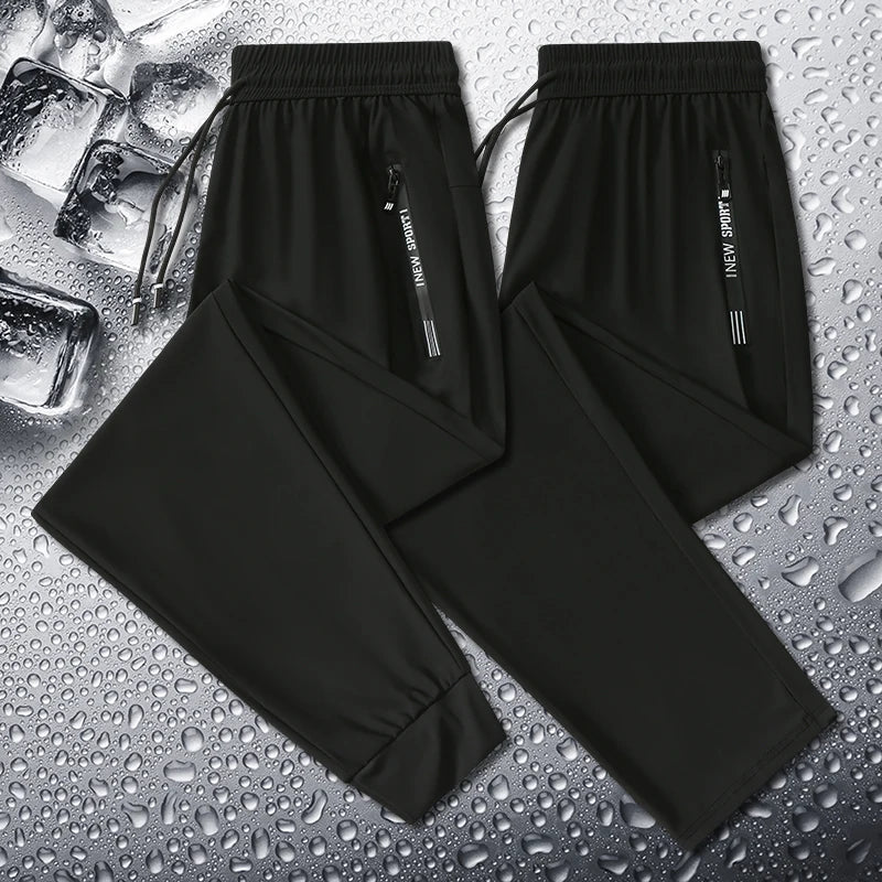 New Summer Korean Ice Silk Elastic Trousers Cool Thin Casual Men'S Loose Long Large Size Small Foot Sports Pants 8XL