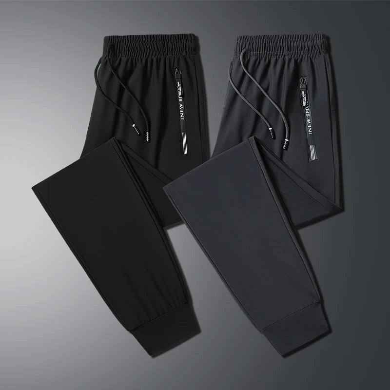 New Summer Korean Ice Silk Elastic Trousers Cool Thin Casual Men'S Loose Long Large Size Small Foot Sports Pants 8XL