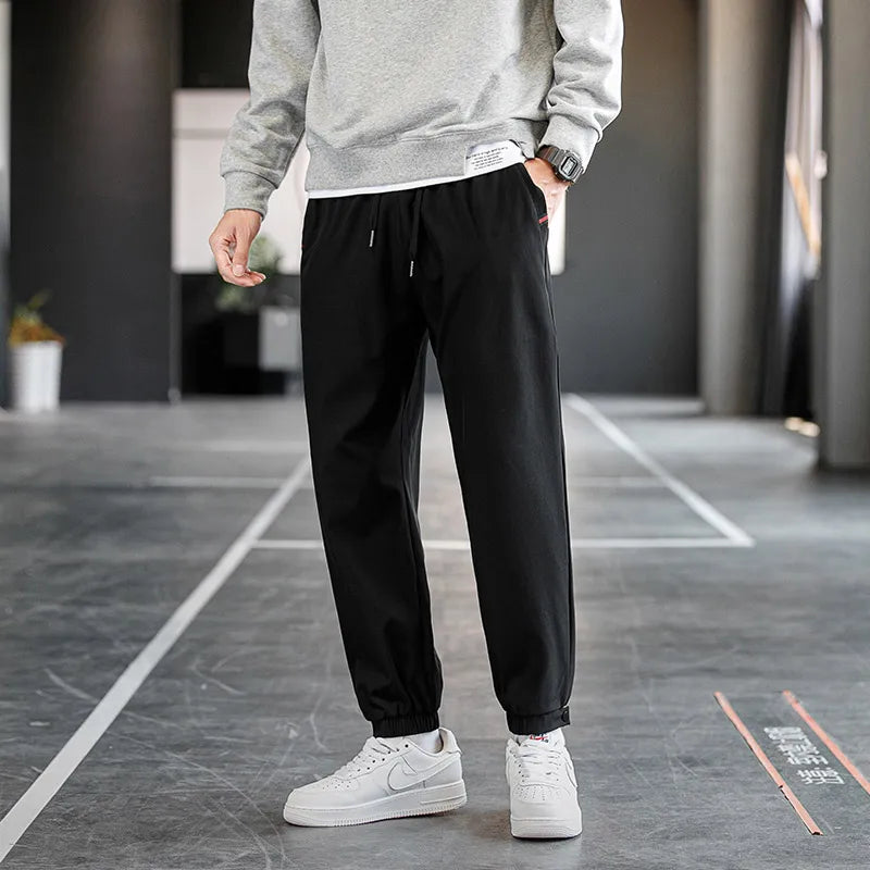 Plus Size Trousers Men's 2024 New M-8XL Ice Silk Pants Drawstring Feet Leisure Sports Running Fitness Harajuku Trousers