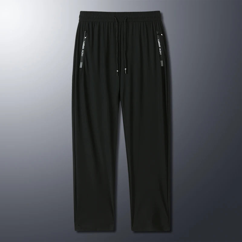 New Summer Korean Ice Silk Elastic Trousers Cool Thin Casual Men'S Loose Long Large Size Small Foot Sports Pants 8XL